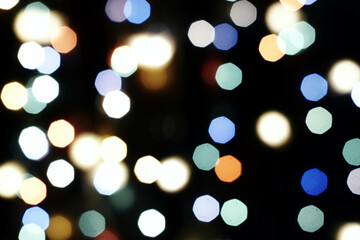 multicolored festive lights on a black background screensaver backdrop