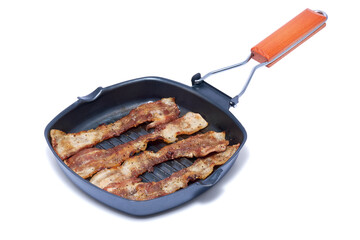 Grill Frying pan with cooked bacon rashers on white background