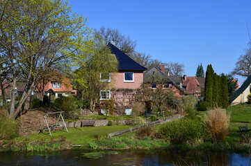 Fototapeta na wymiar Park in Spring in the Village Müden at the River Örtze, Lower Saxony