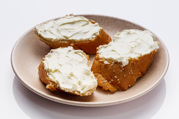 baguette cream cheese sandwich on a white background