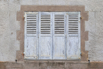 Old Closed Wooden Shutters on Old Building 