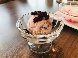 Riceberry rice ice cream topped with sweetened red bean in Thailand.