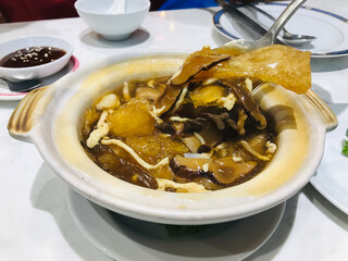 Stewed dried fish maw with brown sauce in Thailand.