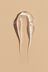 cosmetic smears cream texture on pastel beige background