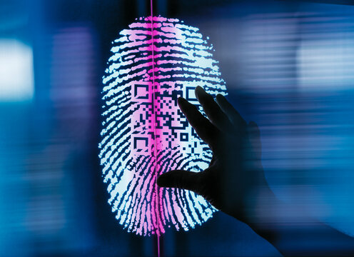 Finger print with QR code being scanned