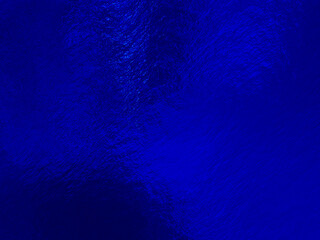 Blue foil background with uneven texture