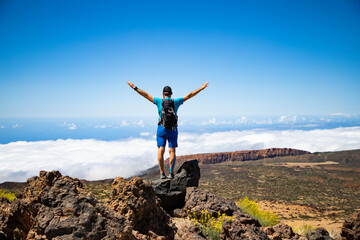 man hiking in El Teide national park  Tenerife - obrazy, fototapety, plakaty