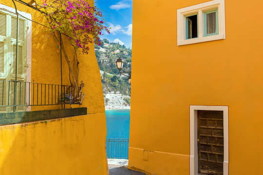 Fototapeta France, French Riviera, Villefranche old city streets in historic city center near sea promenade.