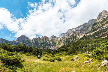 A young woman enjoying the mountain on vacation in the Pyrenees, Alto Gallego, Huesca, Aragon