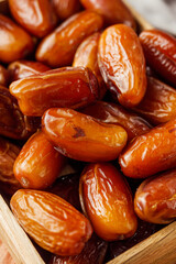 juicy royal dates on a wooden rustic background