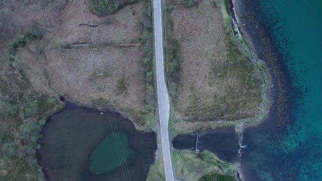 Bird eye, overhead view of Norwegian shoreline with a camp site