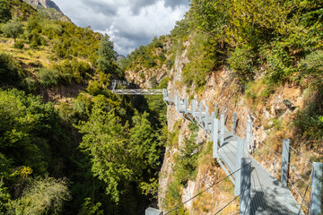 Metal walkway on the mountain in the town of Panticosa in the Pyrenees in summer, Huesca. Spain