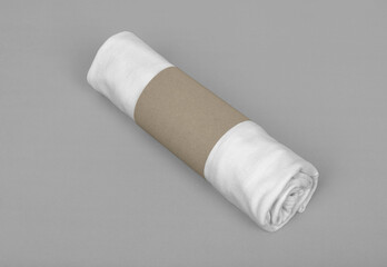 Package with white T-shirt roll mockup template with copy space for your logo or graphic design