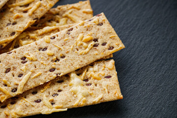 diet crispy bread on a black stone background