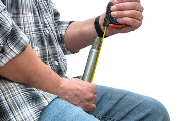 A man holds in his hands a bolt symbolizing the sexual organ. Closeup photo