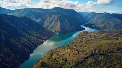 Naklejka na ściany i meble Drone aerial footage of river Drina and Tara mountain landscape..