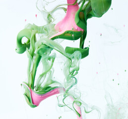 Mixed ink dynamic abstract background with splash of acrylic paint in water