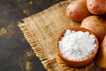 potato starch on a dark rustic background