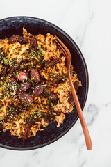 healthy plant-based food, vegan noodles with sundried tomatoes and olives