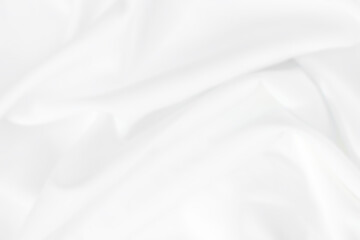 Smooth elegant white silk or elegant satin texture can be used as background.