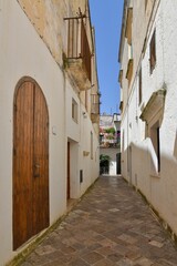 A street in the historic center of Specchia, a medieval town in the Puglia region, Italy.