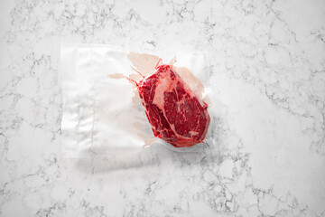 Cut of rib-eye in vacuum sealed bag, ready for sous-vide or freezer