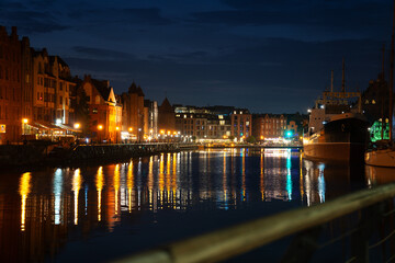 Fototapeta premium Picturesque summer evening panorama of the architectural pier of the Old Town GDANSK, POLAND