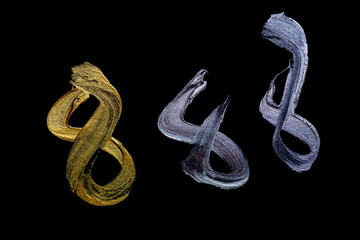 Set of brush stroke texture design isolated on black background. Realistic mascara golden smear template with clipping path.	