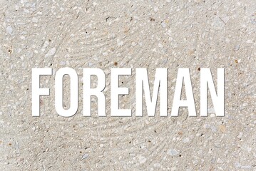 FOREMAN - word on concrete background. Cement floor, wall.