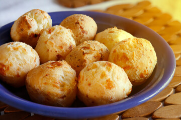 various cheese bread on a plate - Minas Gerais food