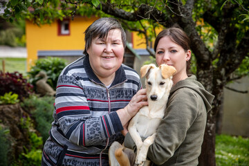 portrait of two women, one of them ist mentally disabled or handicapped