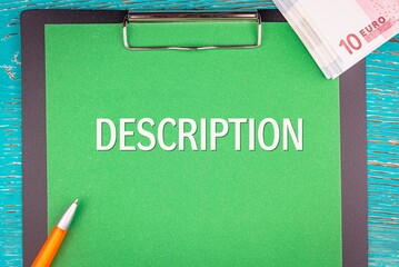DESCRIPTION - word (text) and a bundle of money, euro bills on a green background of a notebook, a...