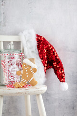 Christmas Decoration, Santa Claus Hat And Wooden Chair.