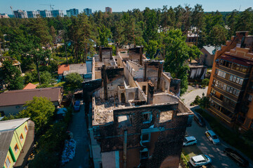 a house in Irpen destroyed by shells of Russian occupiers, drone view