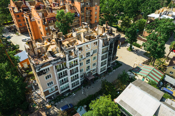 Fototapeta premium a house in Irpen destroyed by shells of Russian occupiers, drone view