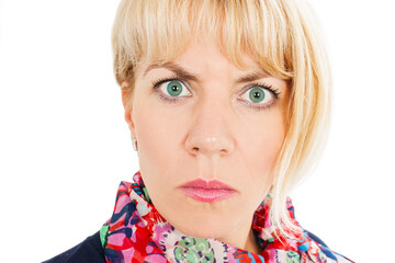 Young serious angry woman portrait. Isolated on white background. Negative human emotions facial expression. Studio shot