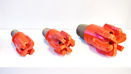 Drill bits for oil wells