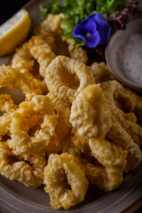 Squid rings in batter with garlic sauce