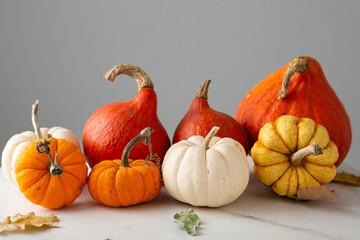 Autumn holiday background with pumpkin set seasonal food