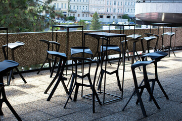 Fototapeta na wymiar cafe interior. chairs and tables, modern restaurant