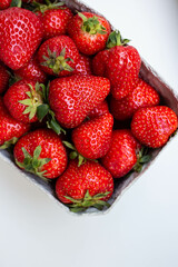 paper basket with fresh strawberry. eco friendly