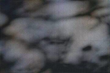 Black mesh plastic texture on gray background, abstract background with shadows
