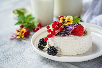 ..Fresh ricotta with berries and flowers
