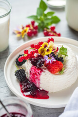 ..Fresh ricotta with berries and flowers