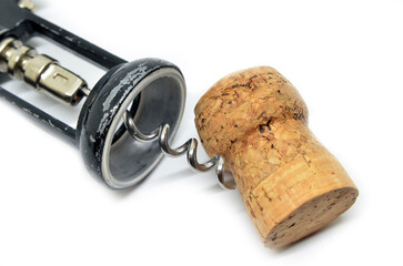 Vintage wooden corkscrew bottle opener and red wine cork
