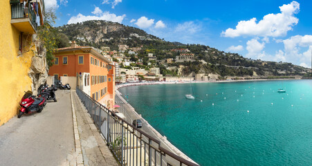 France, French Riviera, panoramic view of Villefranche old city and sea promenade. - obrazy, fototapety, plakaty