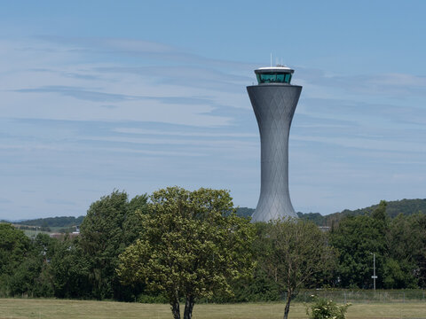Edinburgh-UK-June 20,2022- Air Traffic Control Tower At Edinburgh Airport In UK. Blue Sky And Trees In View