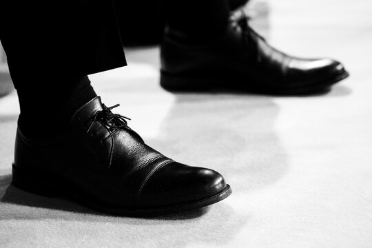 detail of black, men's shoes. photo inside.