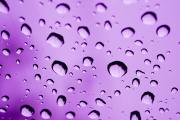 Droplet of water on car mirror, traffic jam
