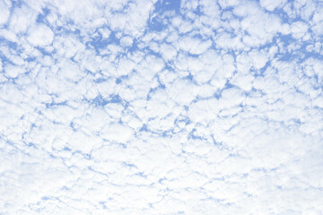 Blue sky covered with white clouds.